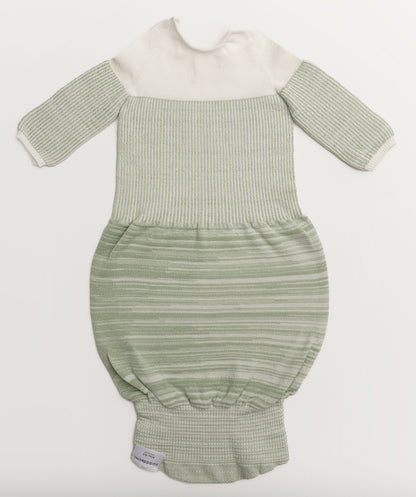 A mint colored bamboo sleep sack.