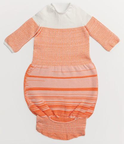 An orange transition swaddle.