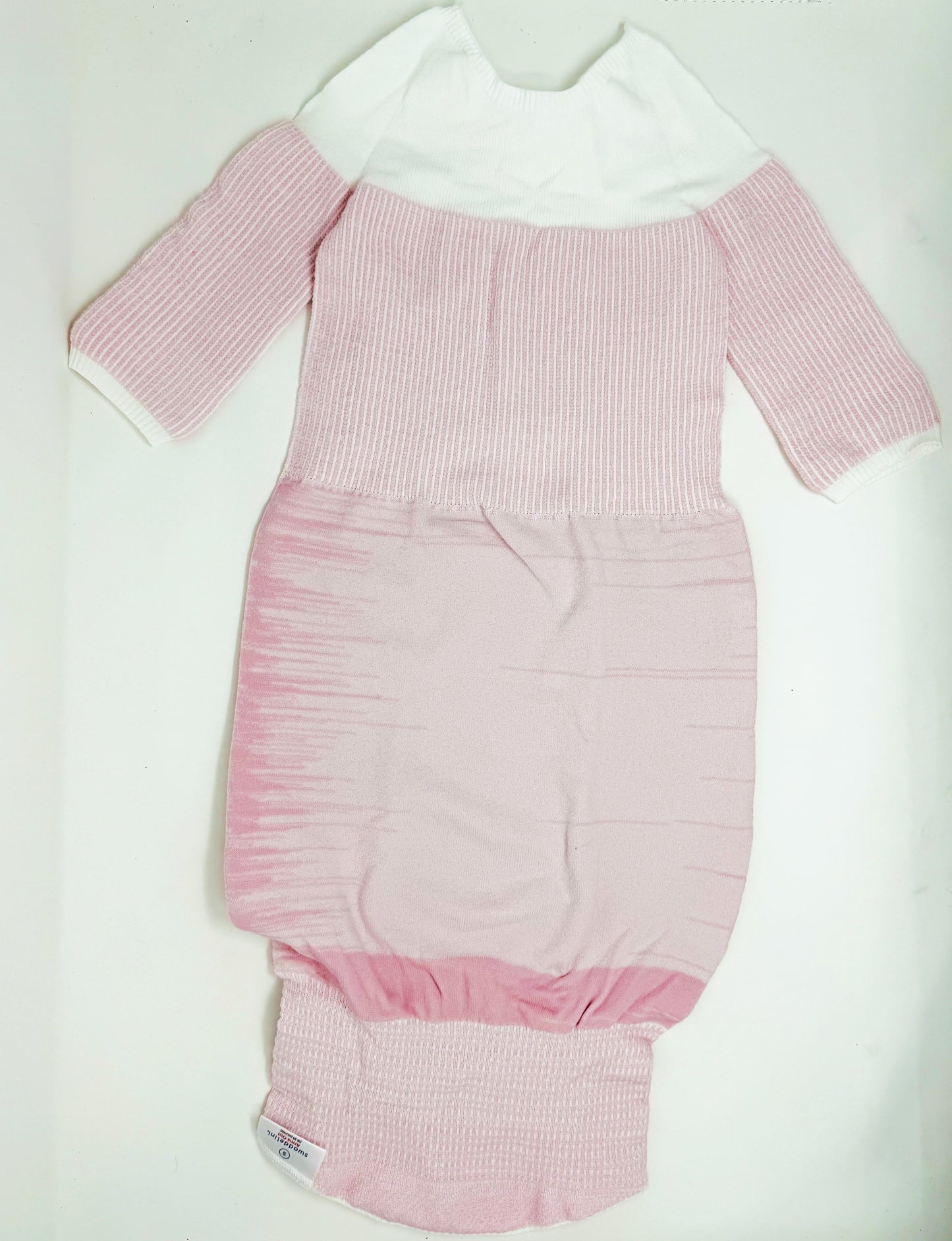 Help your baby girl sleep safely and soundly with the Pink Swaddelini Sleep Sack Bundle — a complete 3-stage system from newborn swaddle to arms-out sleep sack for rolling babies.