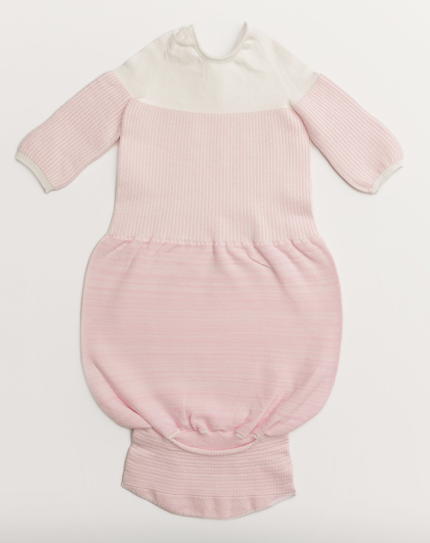 A pink transition swaddle.