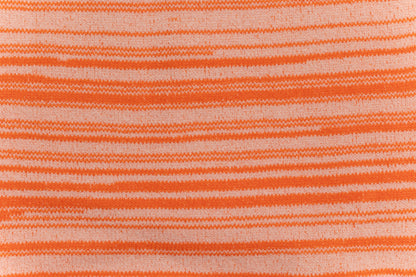A close up of the arms out swaddle.