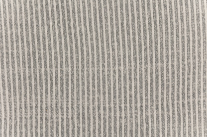 A fabric swatch of a knit baby swaddle.