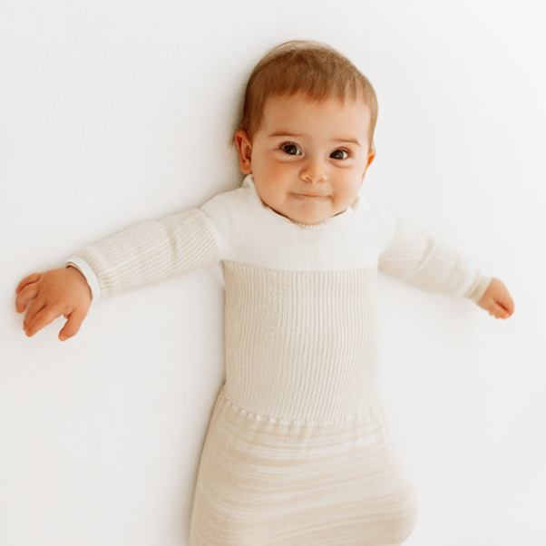 baby in a transition swaddle