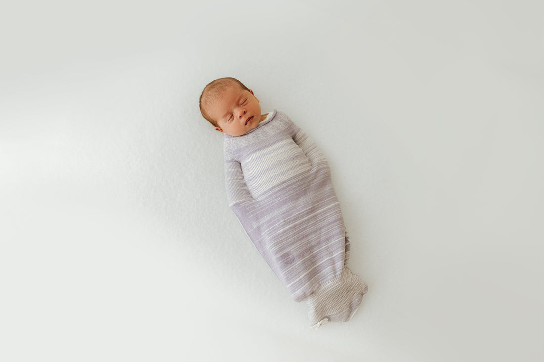 baby sleeping in a swaddle