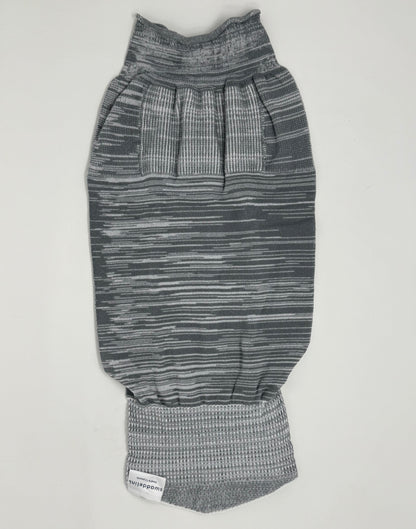 The Grey Swaddelini Sleep Sack Bundle is your complete safe sleep system — from newborn swaddle to arms-out sleep sack. Perfect for rolling babies