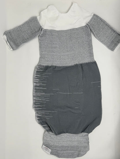 The Grey Swaddelini Sleep Sack Bundle is your complete safe sleep system — from newborn swaddle to arms-out sleep sack. Perfect for rolling babies
