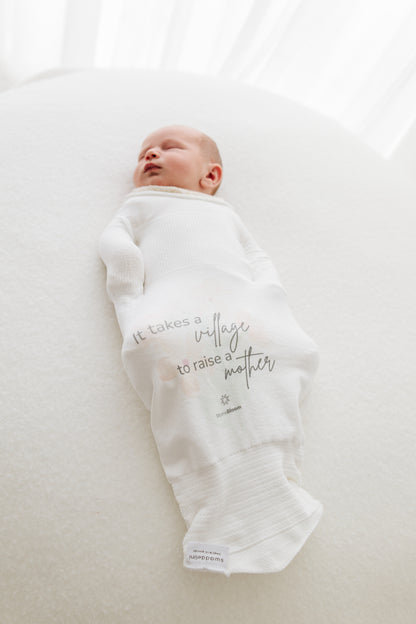 baby sleeping in safe sleepsack with good message to new mothers
