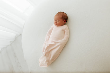 cute baby sleeping in best swaddle 